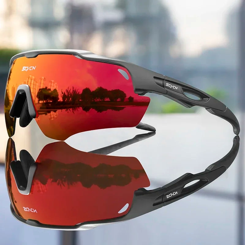 Cycling sunglasses with red reflective lens and dark gray frame, black side grips