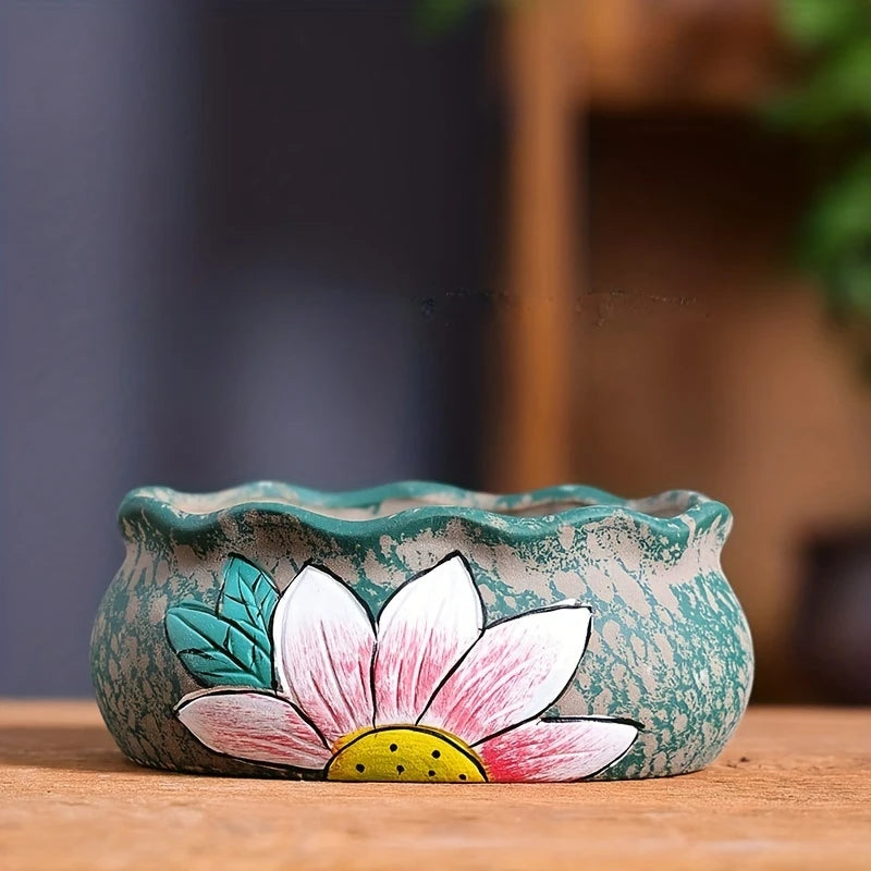 Turquoise speckled ceramic oval planter with painted white-pink lily flower and leaves