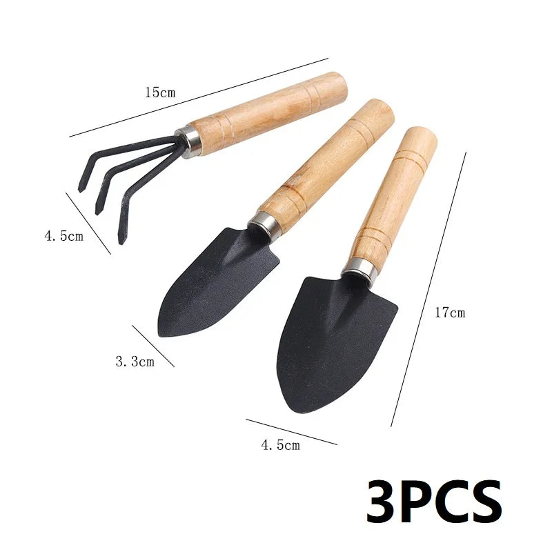 3PCS mini garden tools with wooden handles: rake, shovel, and spade heads
