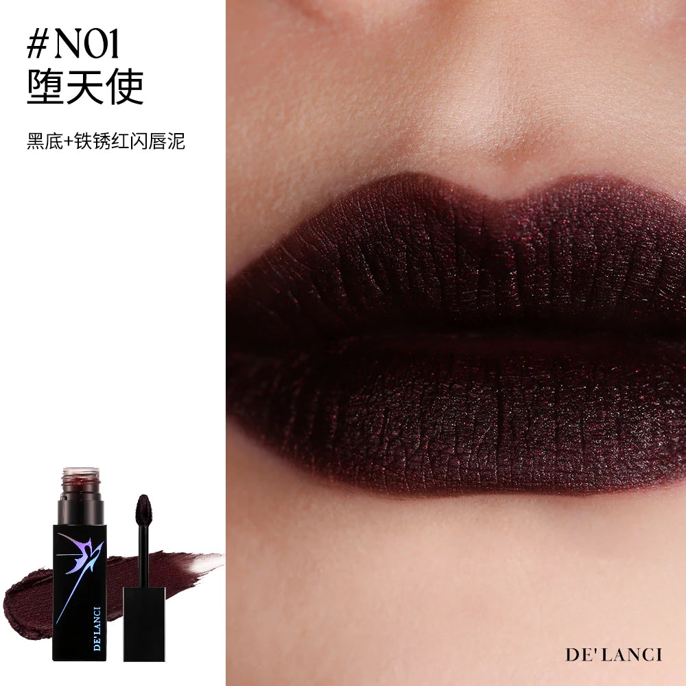 DE'LANCI dark red shimmering lip mud with a gothic, matte-textured finish on lips for a high-color smoky punk look.