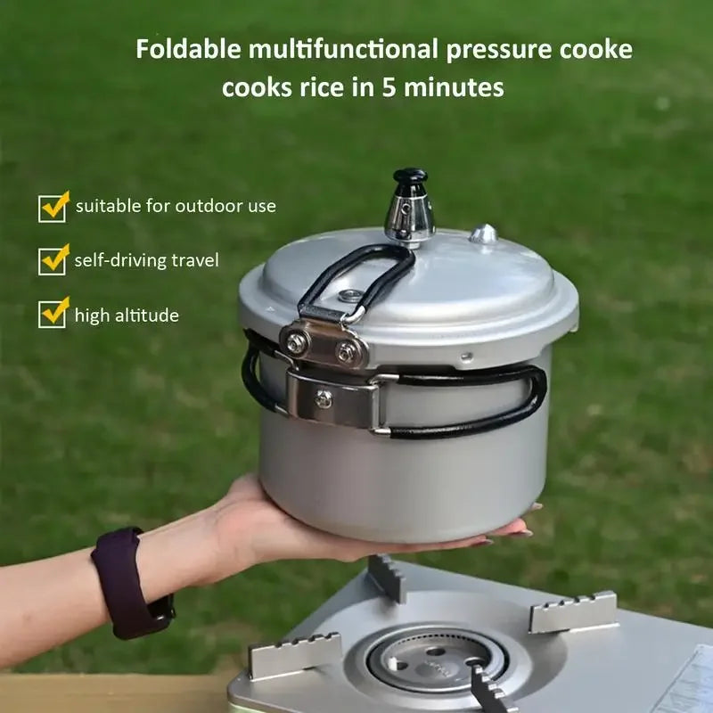 Handheld compact pressure cooker on a camp gas burner with steam outlet valve