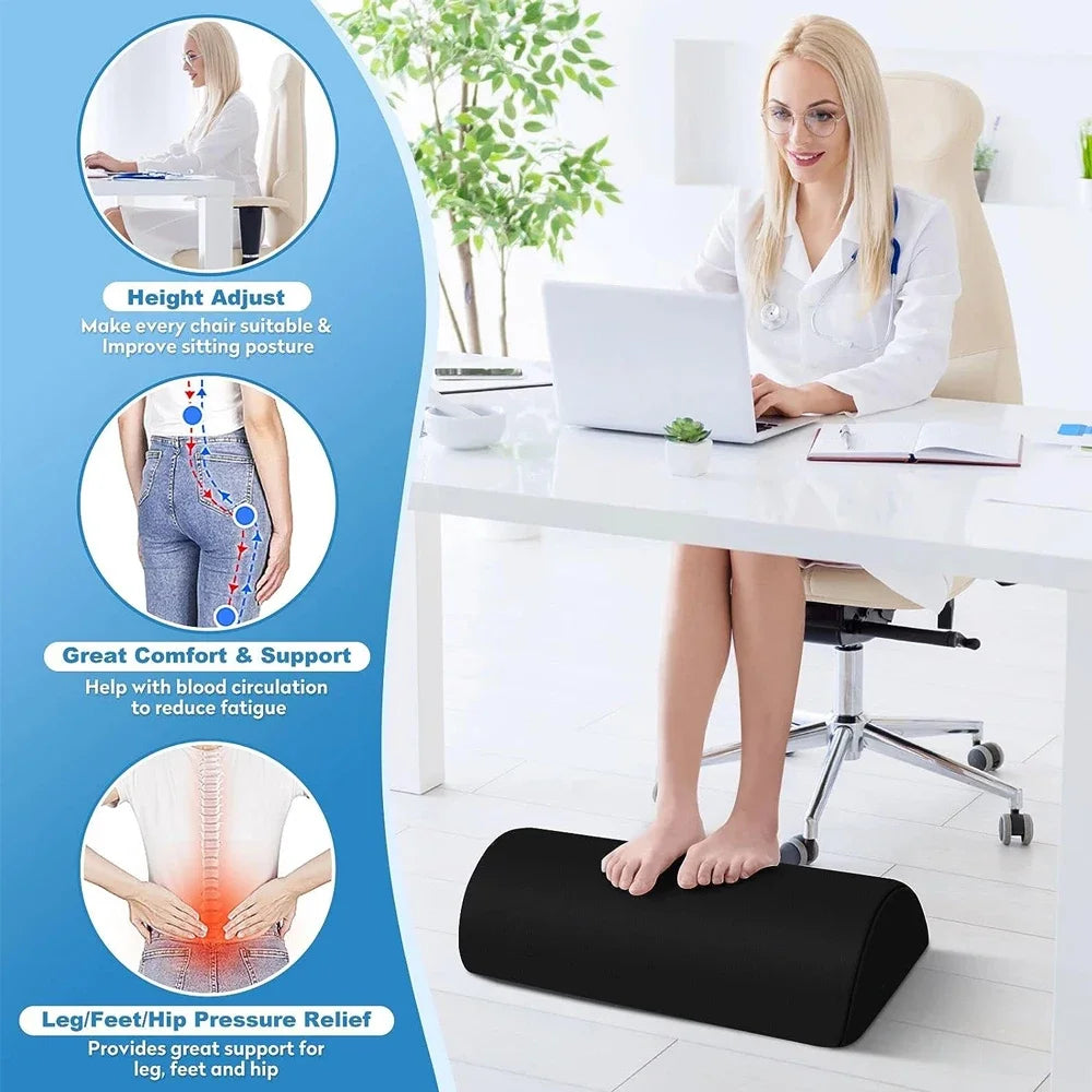 Ergonomic black memory foam under-desk foot rest for improved posture, comfort, and leg fatigue relief at work.