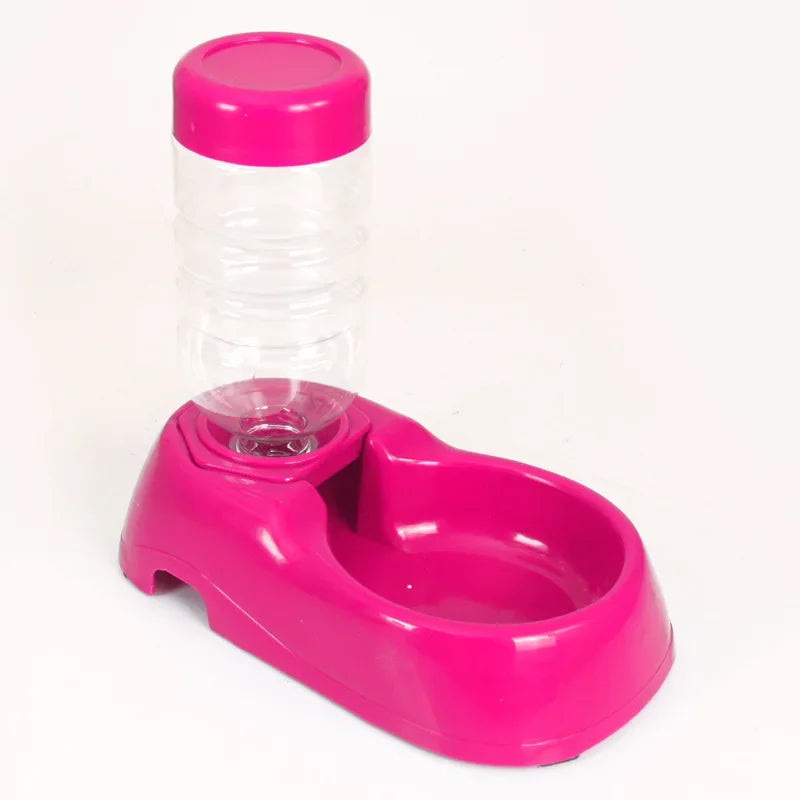 Pink automatic pet water dispenser with refillable bottle for convenient, continuous hydration for dogs and cats.