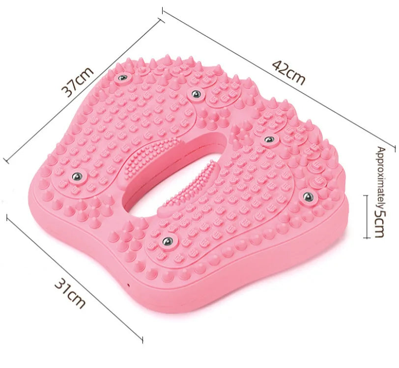 Pink, foot-shaped acupoint massage mat with textured spikes and embedded magnetic stones, labeled with dimensions.