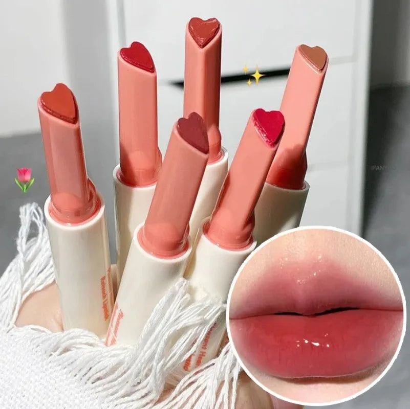 Moisturizing heart-shaped lipstick pens with a glossy, mirror-finish jelly lip glaze texture in various shades.