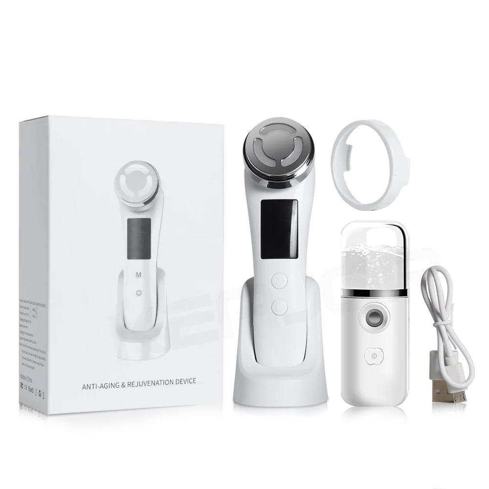 White RF/EMS facial massager kit with charging base, portable mister, and USB cable, shown next to its product box.