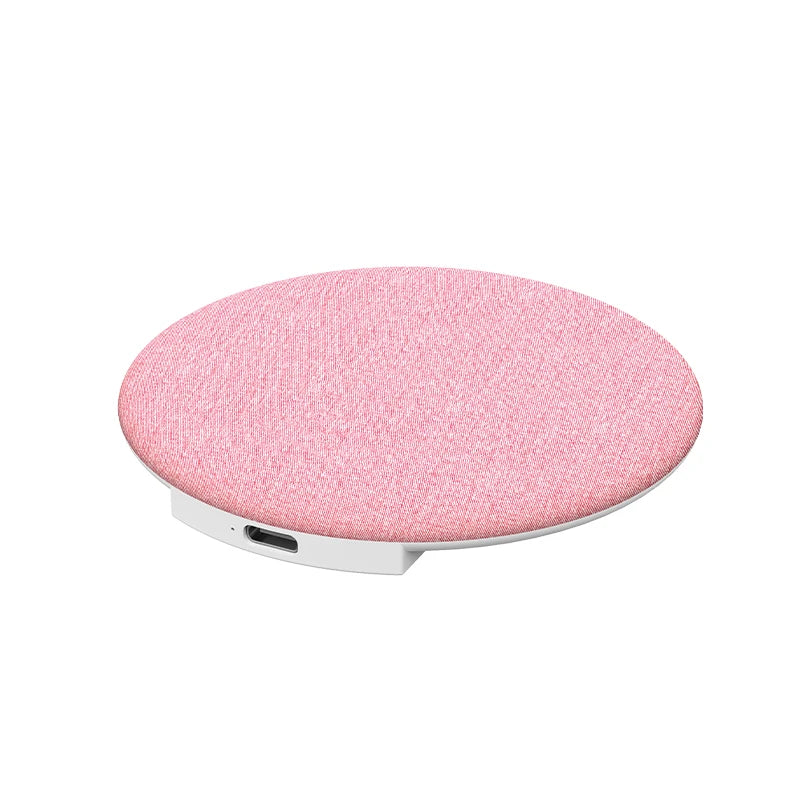 Wireless sleep pillow speaker, oval pink fabric disc with side charging port