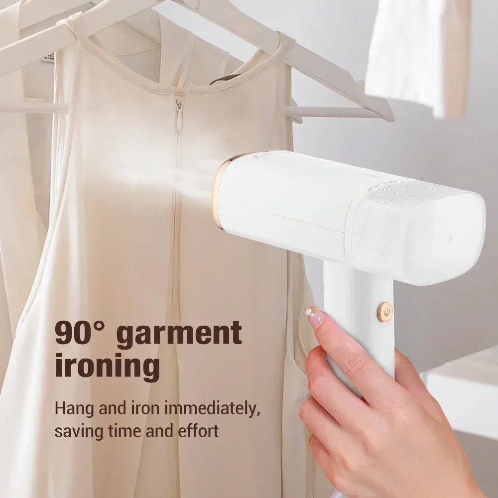Tidesmit 1000W handheld garment steamer showing the 130ml water tank and portable heating element design.