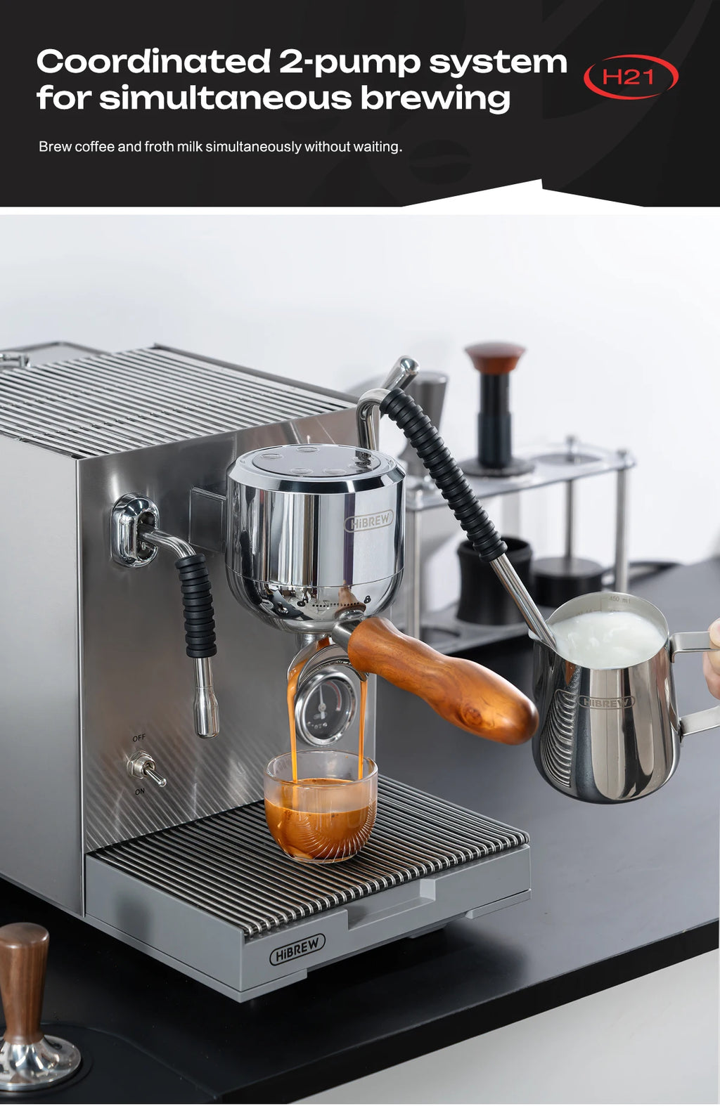 HiBREW H21 stainless steel dual-pump espresso machine pulling a shot and frothing milk with wood-handle portafilter.
