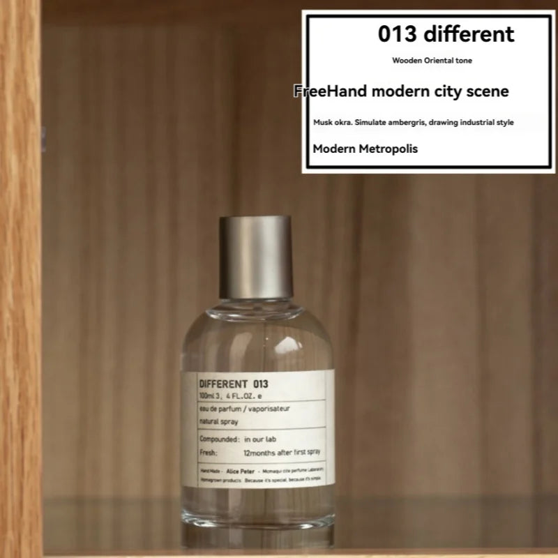 013 Different Unisex EDP, 100ml clear bottle with musk and ambergris notes. Modern industrial style perfume for all.
