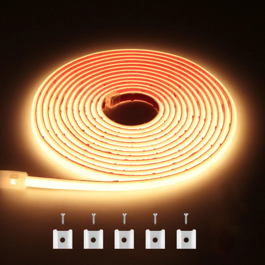 Self-adhesive COB LED strip coil, warm white glow, with small connector modules