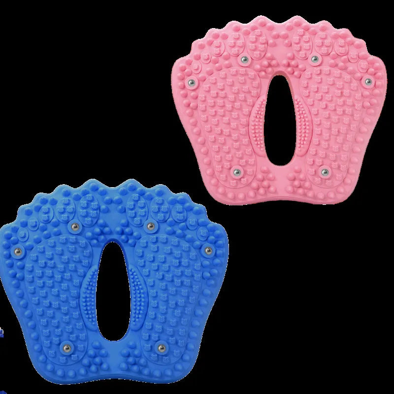 Two foot-shaped massage mats in pink and blue, featuring acupoint nubs and embedded magnetic stones.