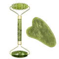 Green jade facial roller with ridged and smooth ends and a matching heart-shaped gua sha tool for skin massage.