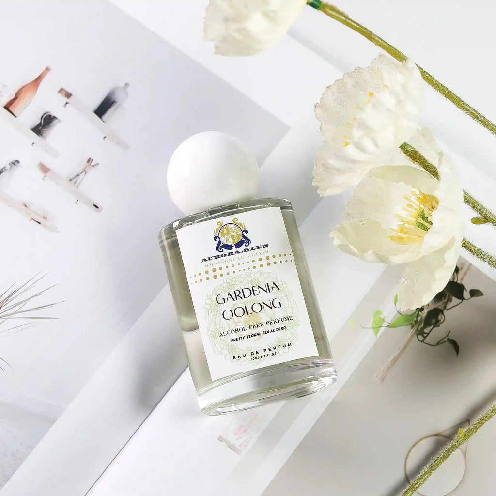 Aurora.Glen Gardenia Oolong Tea 20% essential oil perfume. Unisex floral scent in a clear bottle with round white cap.