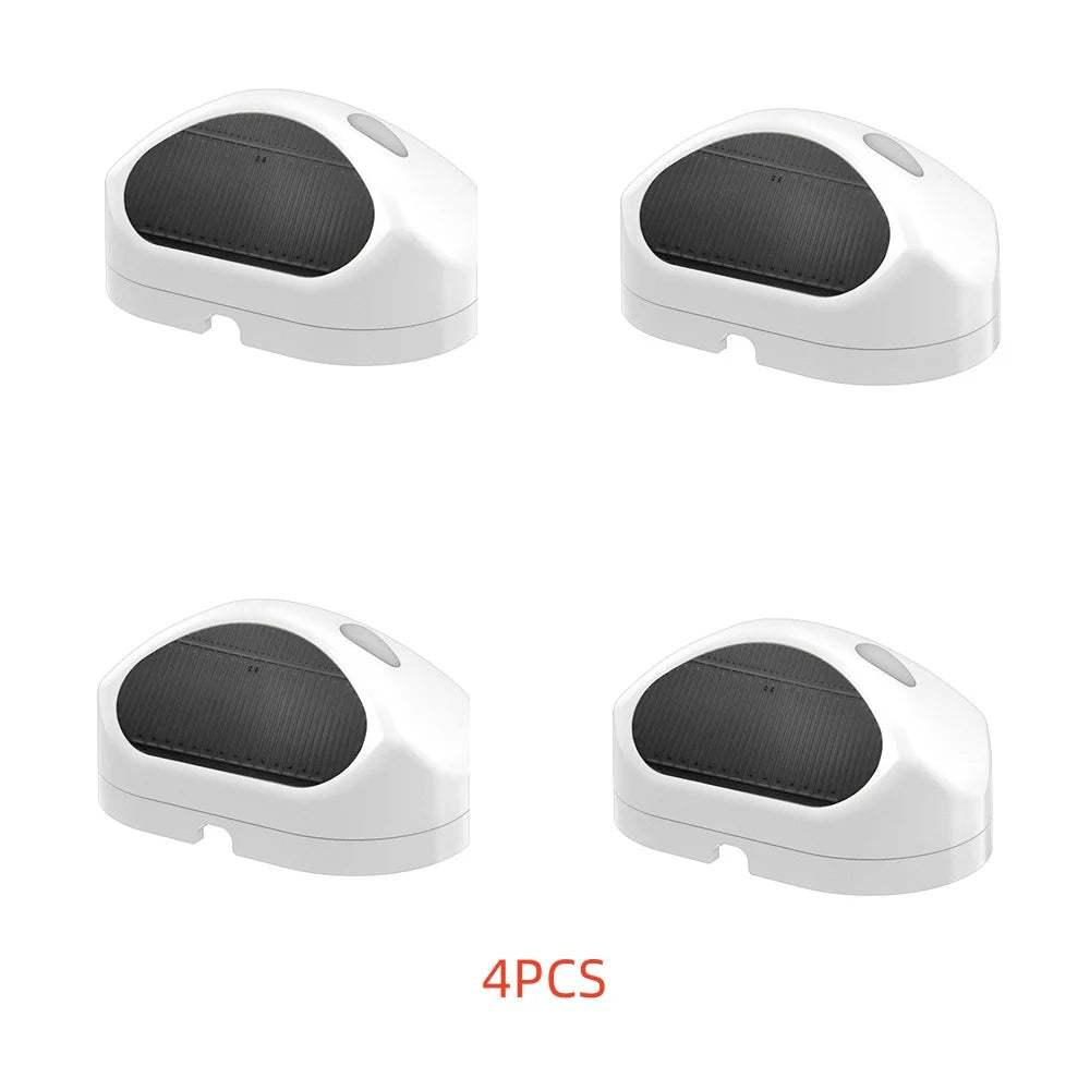 Set of four white rain sensors with oval dark sensing windows arranged in a grid