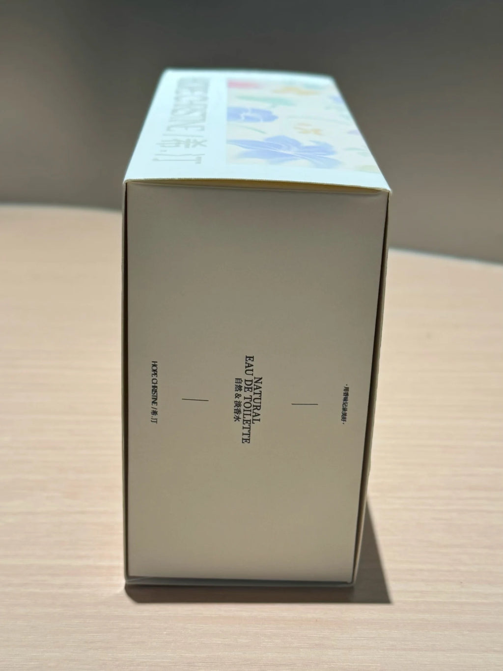 HOPE CHRISTINE mini perfume gift set in a clean white rectangular box with floral packaging and minimalist branding.