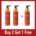 Three pump bottles of Magic Luxury Body Oil with red labels against a white background, text reads "Buy 2 Get 1 Free."