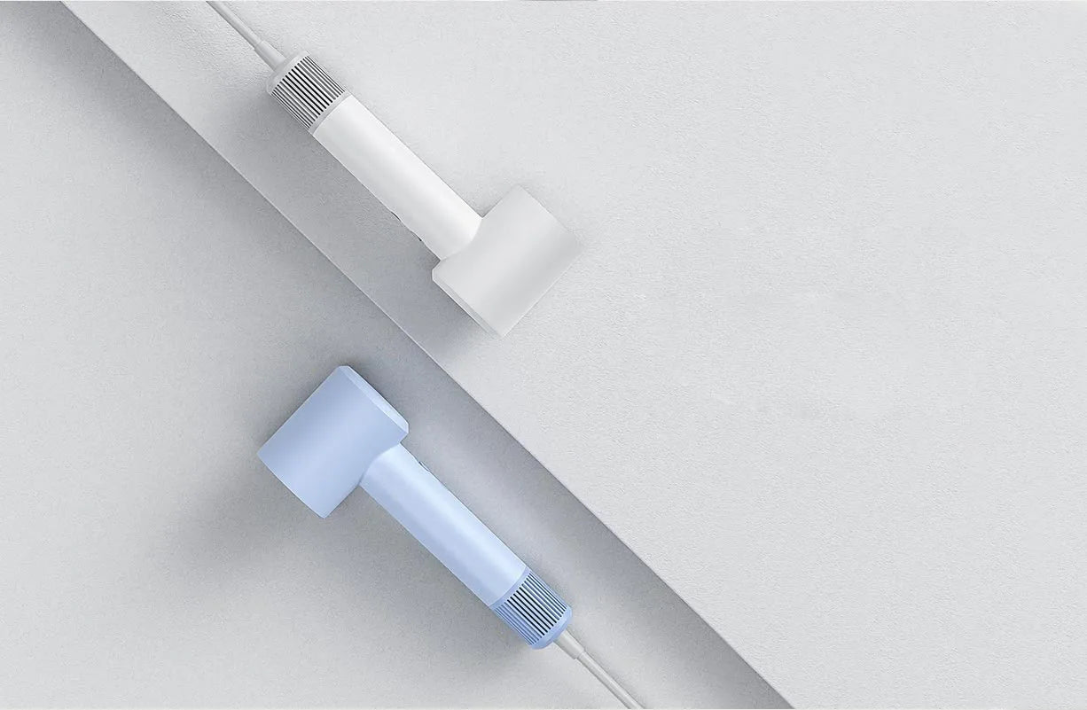 MIJIA H501SE high-speed hair dryer in white and blue, featuring sleek, compact ionic styling design.