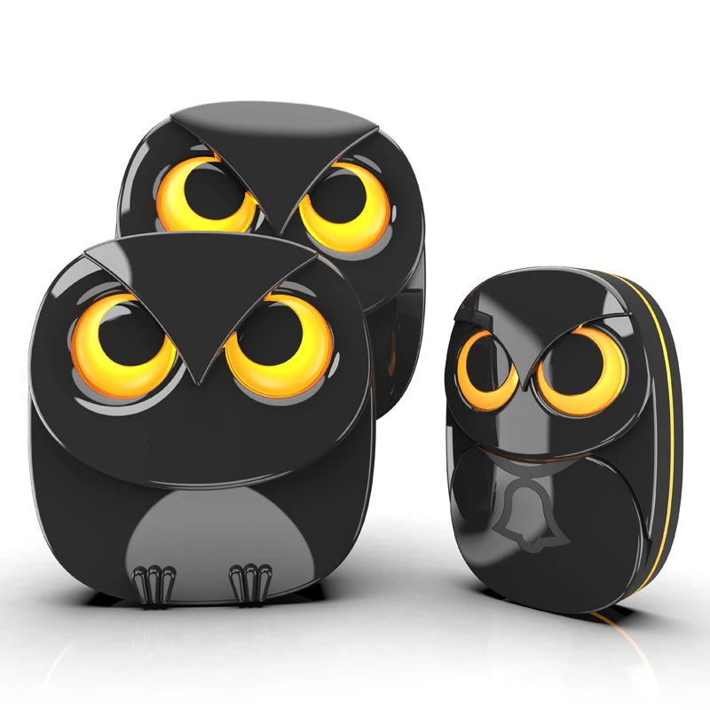 Wireless doorbell chime set with three black owl-style chime units, glowing yellow eyes