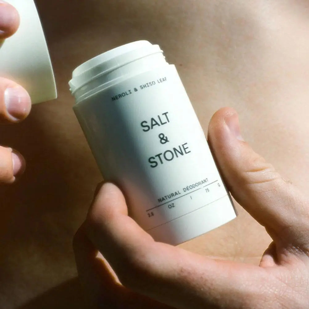Tidesmit SALT&STONE natural plant-based deodorant stick in Black Rose, Oud, Neroli, and Basil for odor control.