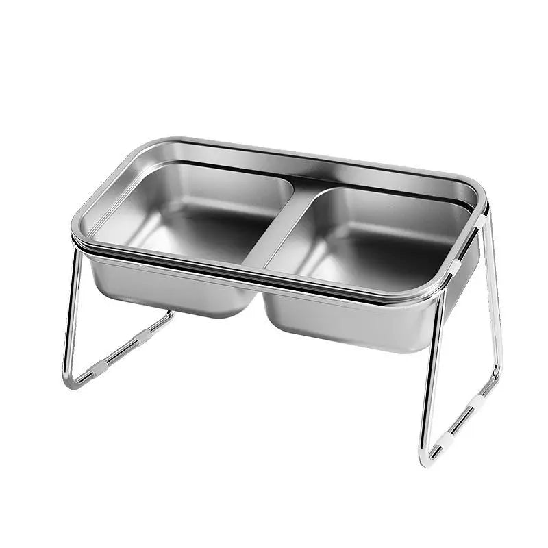Slanted stainless steel double pet bowl for cats and dogs to prevent neck strain and improve feeding posture.
