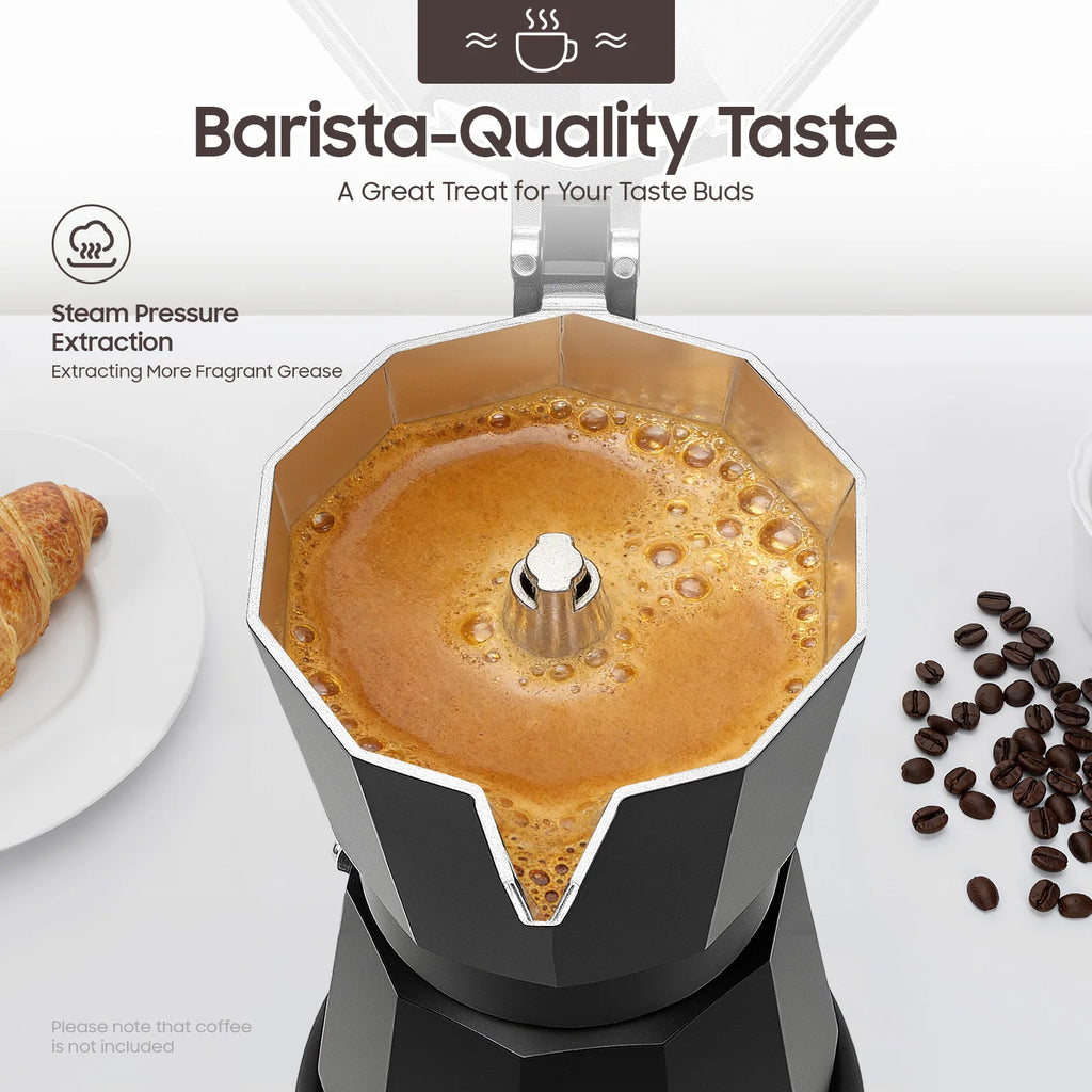Black aluminum moka pot brewing fresh coffee with steam pressure, top-down view of stovetop espresso maker.