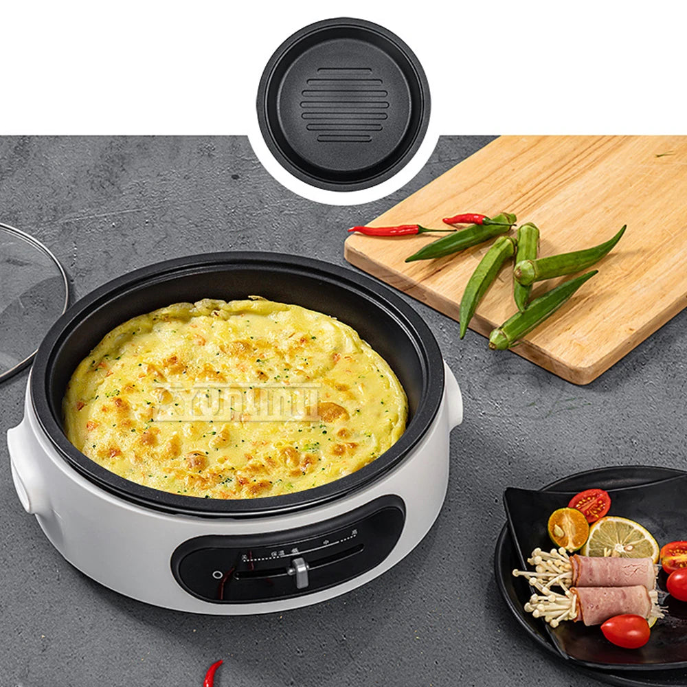 Portable electric multi-cooker with lid over cheesy dish and black nonstick inner pan