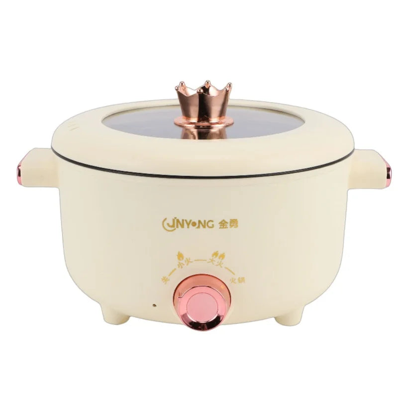 Cream electric cooker with copper burner top, side handles, and front round temperature dial