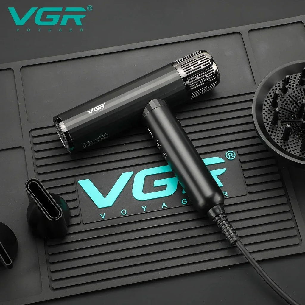 VGR V-427 black professional ionic hair dryer with diffuser and concentrator attachments on a salon mat.