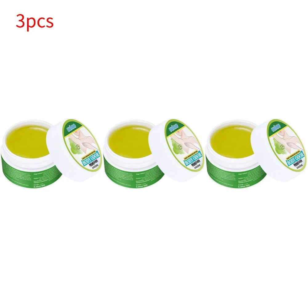 Three jars of natural herbal underarm deodorant cream with a smooth yellow balm texture and white screw-top lids.