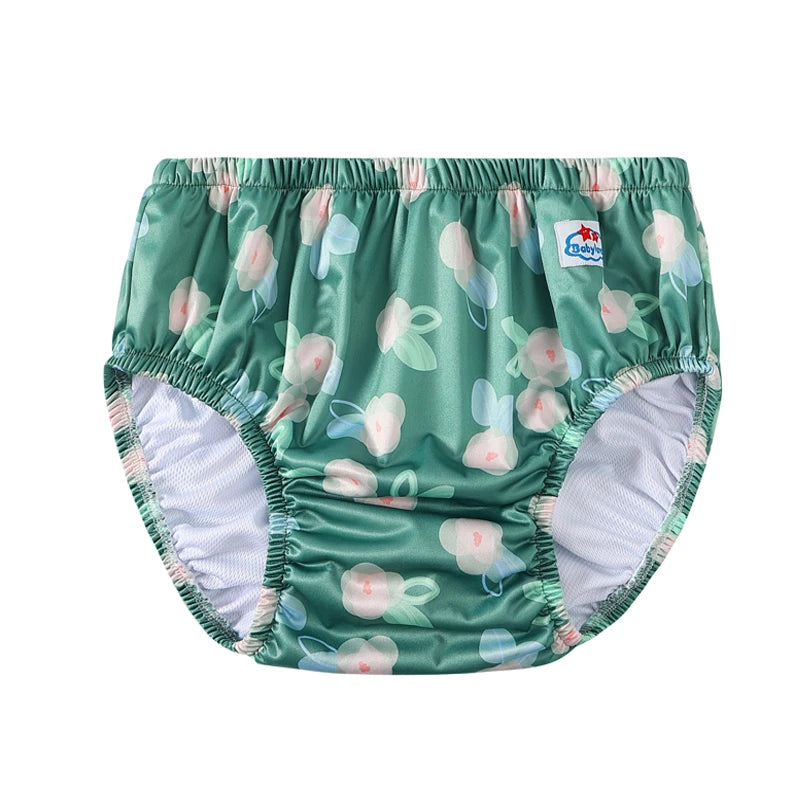 BabyLove green floral print reusable baby training diaper with elastic waistband and leak-proof lining.
