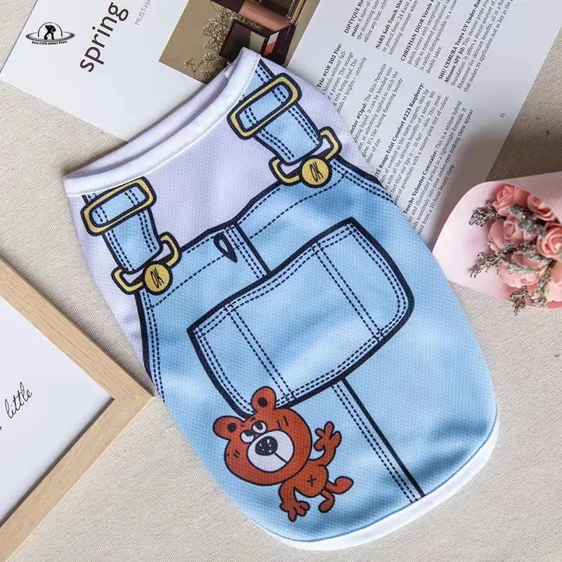 Cute blue denim-style cartoon puppy vest for small dogs. Breathable summer pet shirt for a comfy, stylish look.