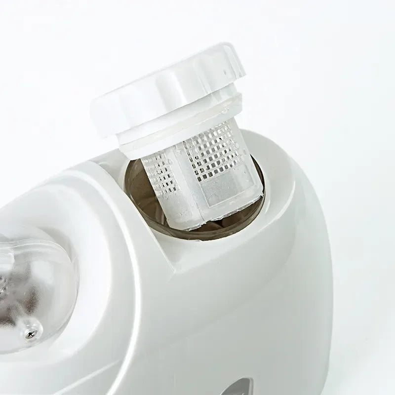 White portable facial steamer with removable internal filter for hot ozone skin care and facial sauna treatments.