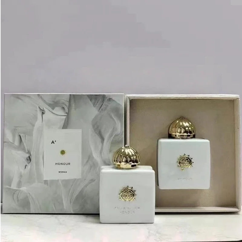 Amouage Honour Woman EDP: White square luxury perfume bottle with gold cap, elegant floral oriental Arabian fragrance.