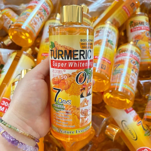 Anti-inflammatory turmeric oil serum in yellow packaging for skin whitening and dark spot repair.