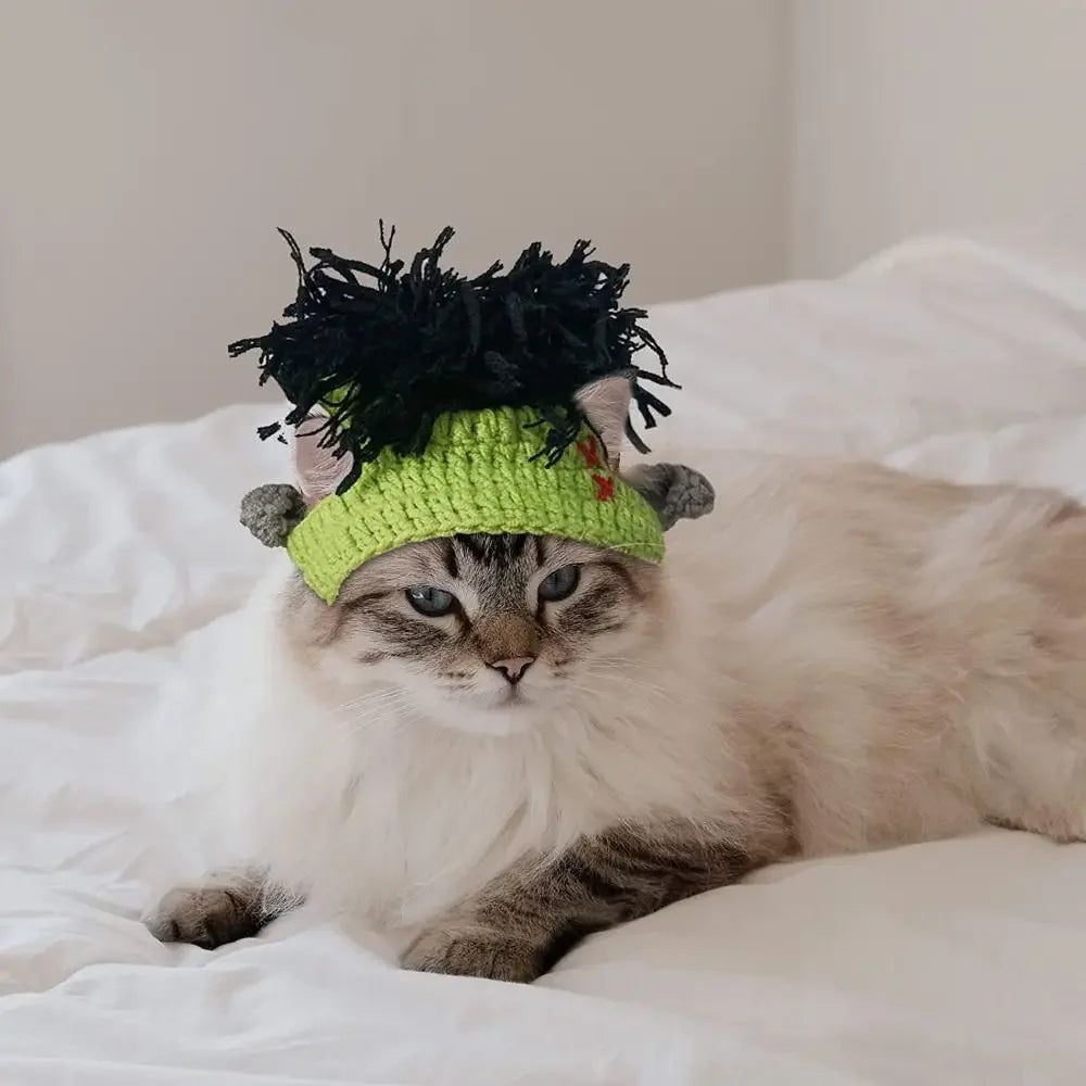Funny green knitted Frankenstein cat hat for Halloween cosplay. Adjustable elastic cap for cats and small pets.