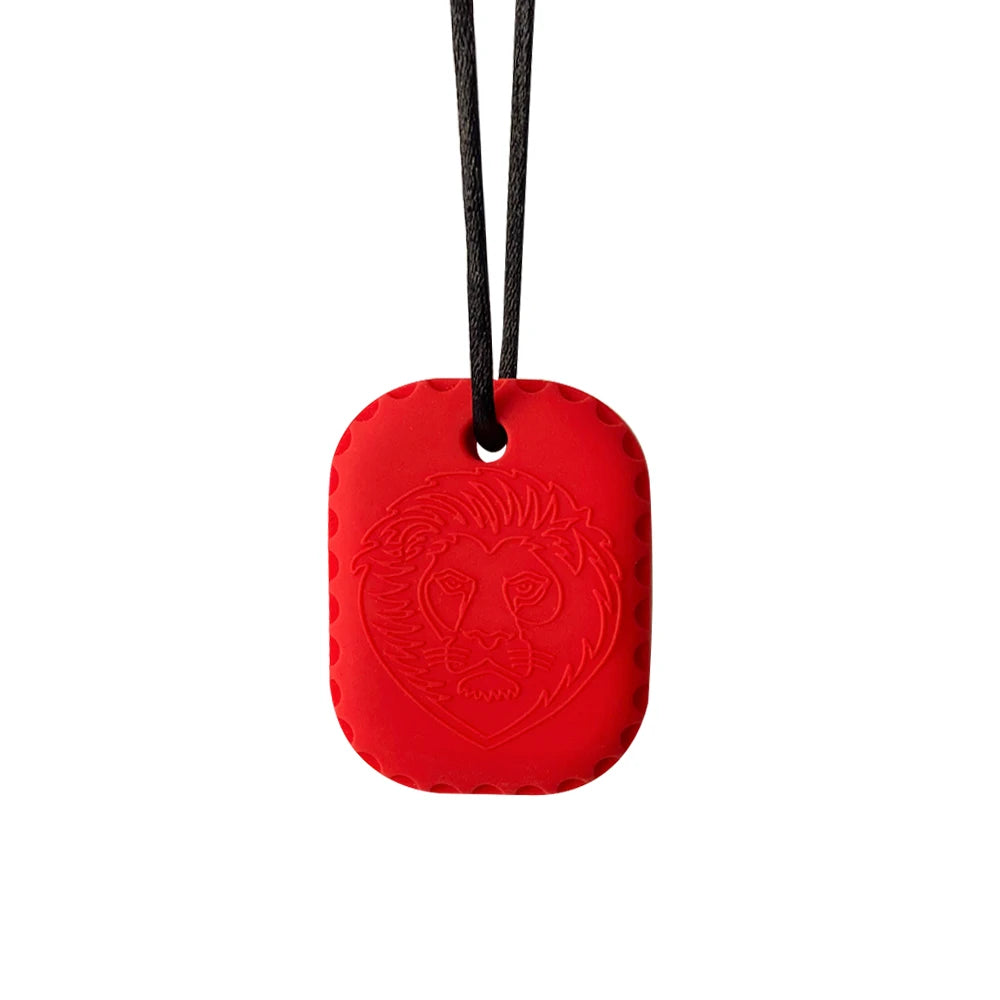 Red silicone teething toy with lion design for baby teething relief on a black necklace cord.
