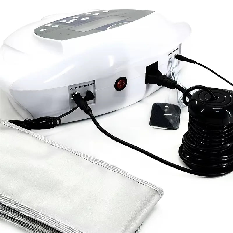 White ionic foot bath detox machine with digital display, black ion array, and infrared strap for home wellness.