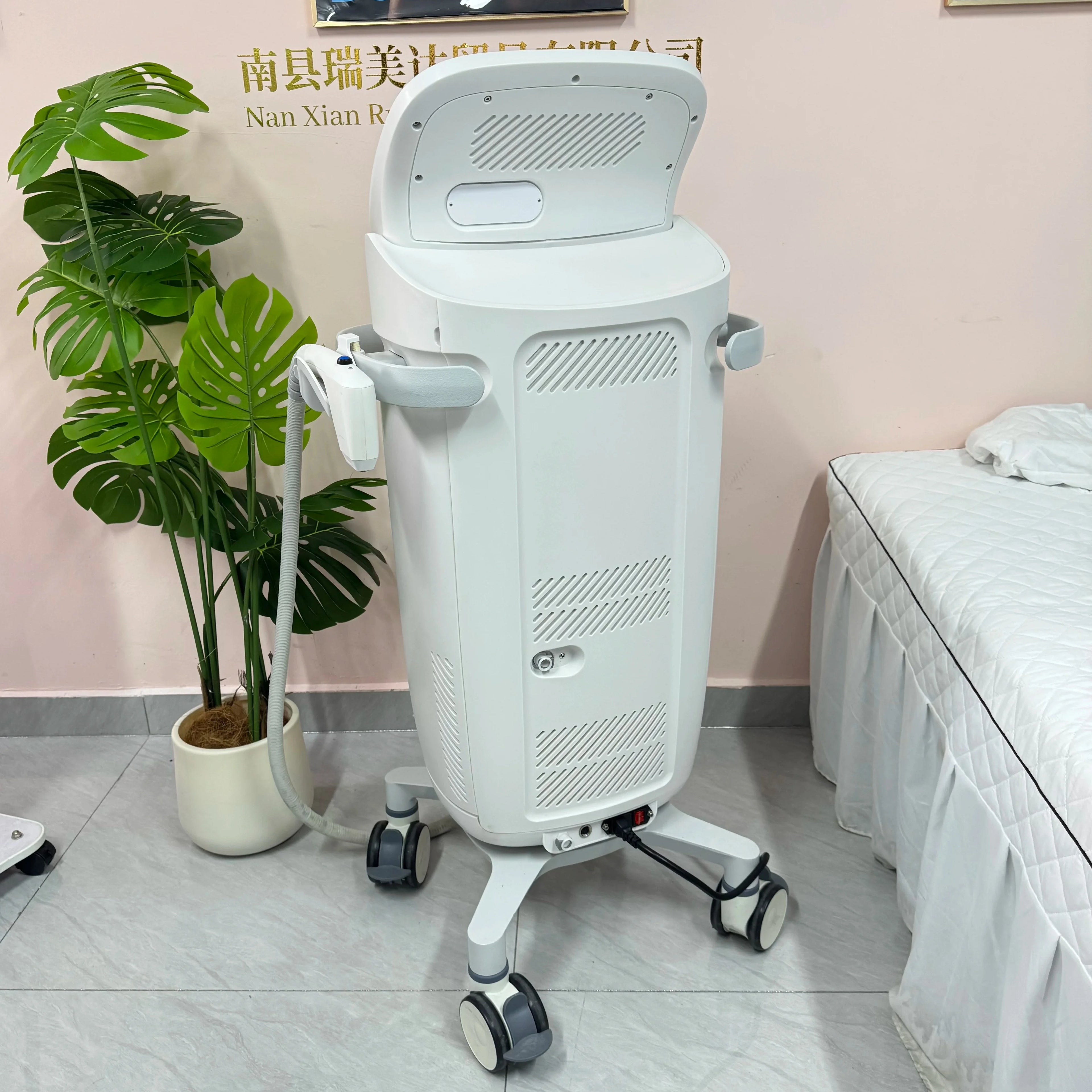 White professional HIFU facial lifting and anti-wrinkle beauty machine on wheels for skin care and body tightening.