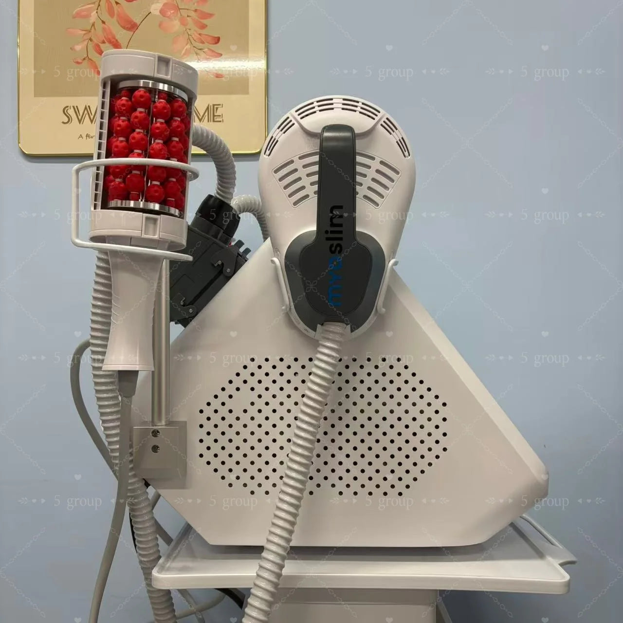 EMS body sculpt machine with 360-degree red inner ball roller applicator for cellulite reduction and muscle toning.