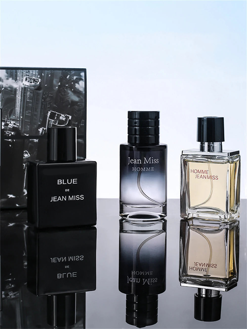 Jean Miss Homme 3pc men's fragrance gift set. 90ml cologne collection with sleek square and gradient glass bottles.