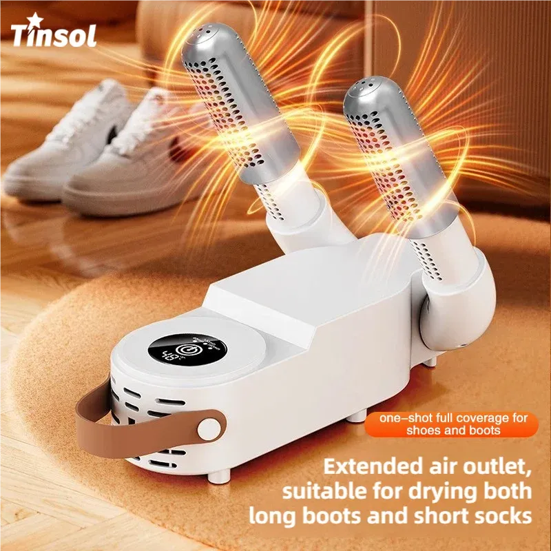 Tinsol electric shoe dryer with digital display and dual heated air outlets drying sneakers on a floor.