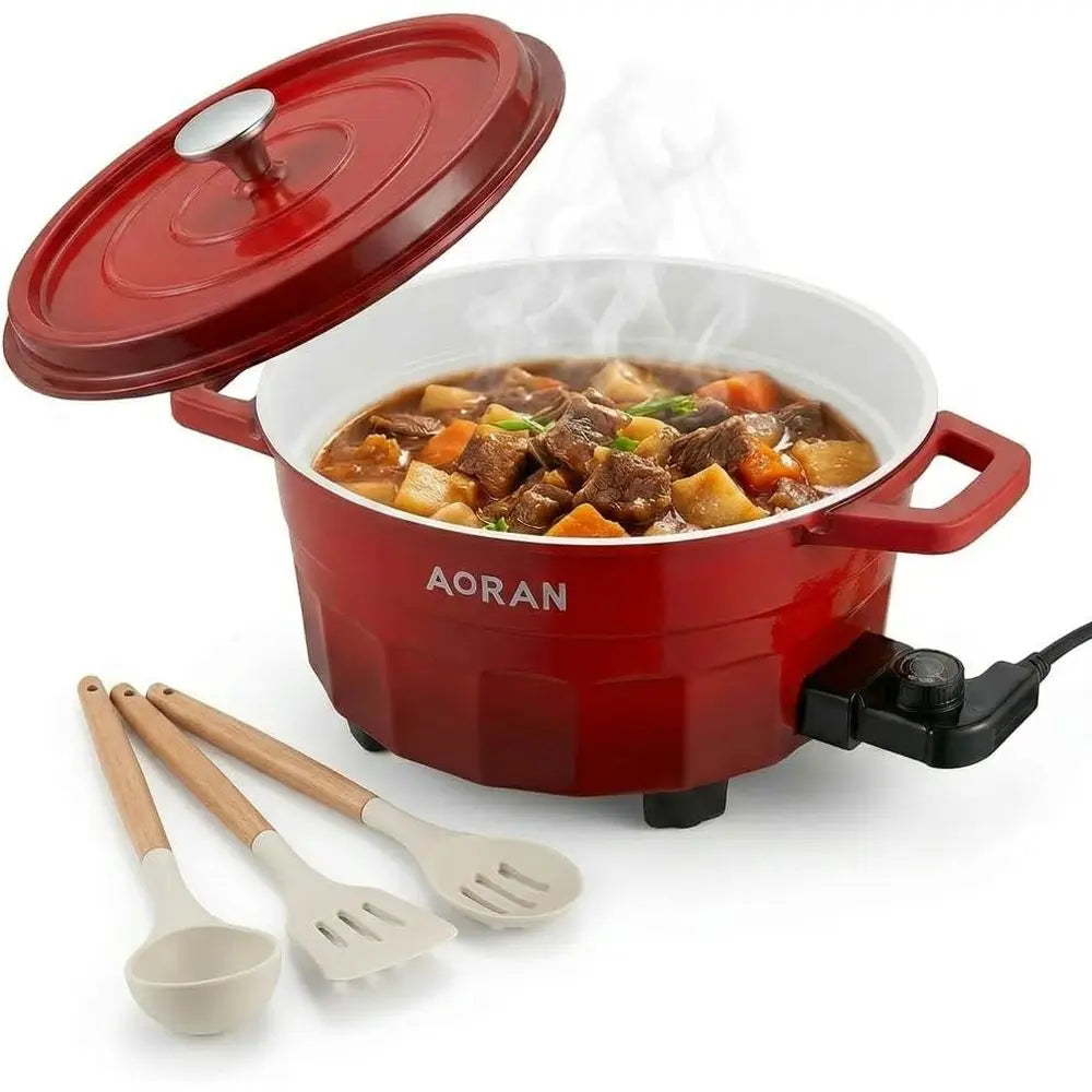 Red electric hot pot cooker with glass lid, side handles, and utensil accessories