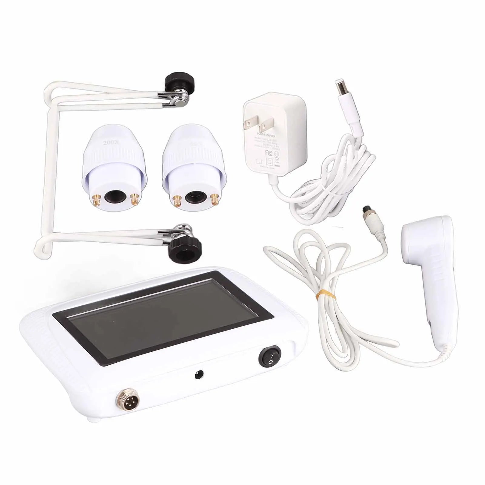 White digital skin and hair follicle analyzer kit with 50X/200X lens, monitor screen, and power adapter on white.