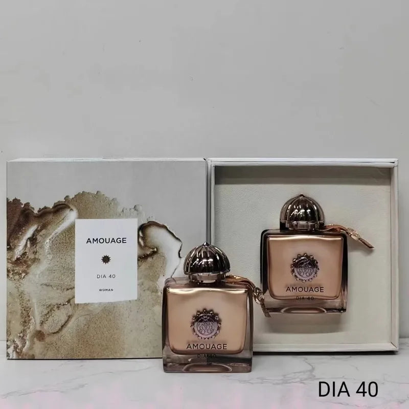 Amouage Dia 40 Woman EDP: Luxury square glass bottle with metallic gold finish and ornate cap in elegant gift box.