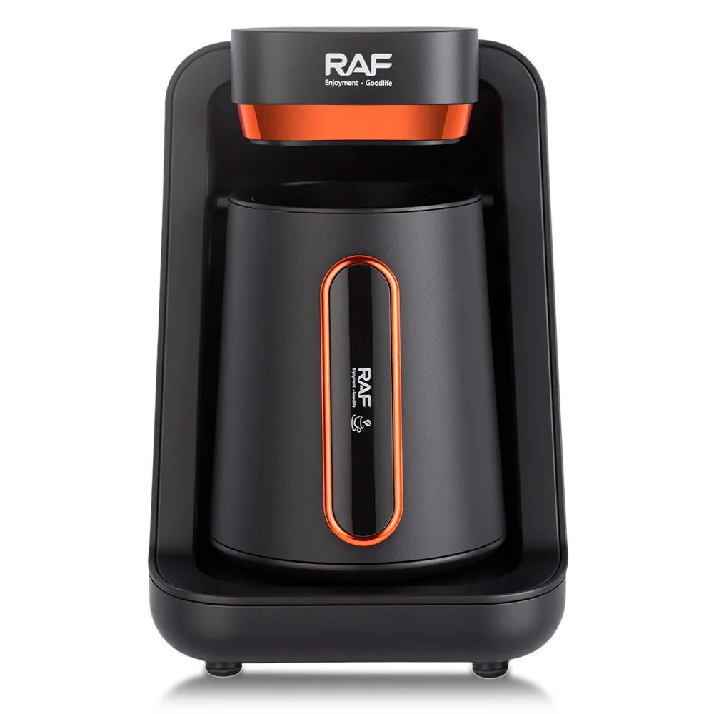 RAF black and orange electric Turkish coffee maker with a sleek, modern compact design for home brewing.