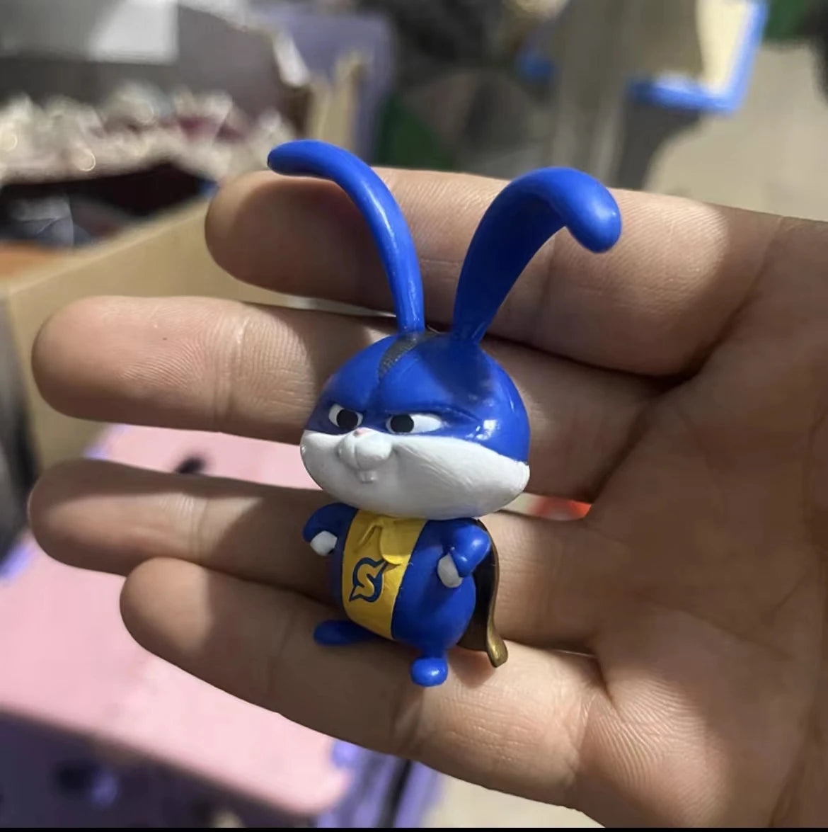 Blue Snowball rabbit toy from Secret Life of Pets, small PVC collectible figure for fans, kids' gifts, and decor.