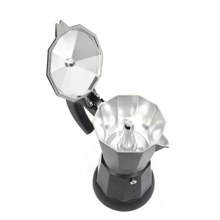 Open silver and black aluminum moka pot stovetop espresso maker for brewing coffee on white background.