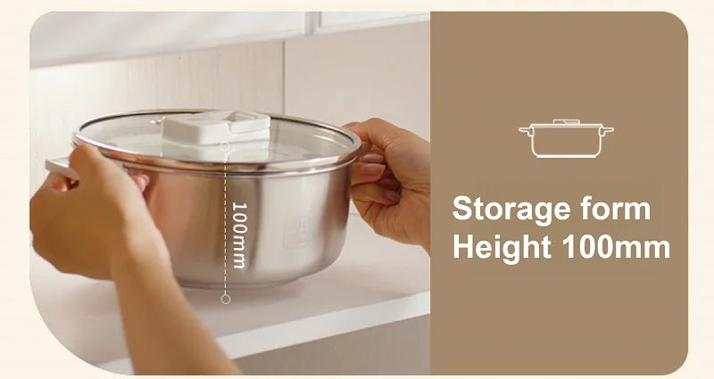 White portable electric cooking pot with stainless inner pot and clear lid