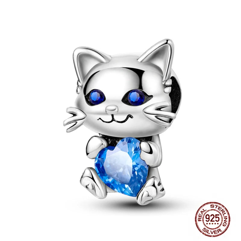 Real 925 sterling silver cat charm with blue heart crystal for DIY charm bracelets. Perfect pet lover jewelry gift.